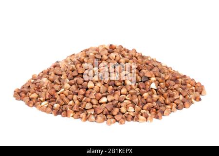 Pile Buckwheat isolated on white background. Buckwheat groats. Stock Photo