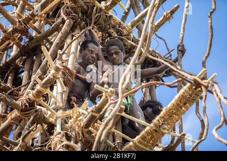 Pentecost pentercost island Vanuatu - 2019: Traditional Melanesian Nagol land diving ceremony (Men jumping with vines from wooden towers). Initiation. Stock Photo