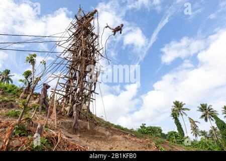 Pentecost pentercost island Vanuatu - 2019: Traditional Melanesian Nagol land diving ceremony (Men jumping with vines from wooden towers). Initiation. Stock Photo