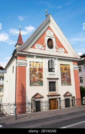 Lana, South Tyrol, Italy – July 2, 2016. Exterior view of the St. Johannes Nepomuk church, originally known as Maria Hilf church, in Lana, Italy. Stock Photo