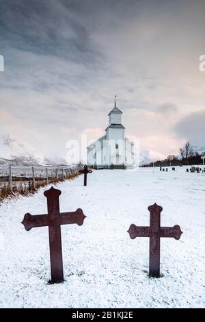 Cemetery with graves and church of Gimsoy, Gimsoykirke, Gimsoy, Lofoten, Norway Stock Photo
