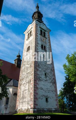 Bled, Slovenia – July 5, 2019. Tower of the pilgrimage church dedicated to the Assumption of Mary (Cerkev Marijinega vnebovzetja) on Bled Island in Sl Stock Photo
