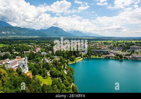 Bled, Slovenia – July 6, 2019. View over Bled town on the shore of Lake Bled in Slovenia. View with commercial properties and residential buildings in Stock Photo