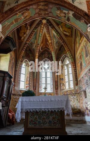 Ribcev Laz, Slovenia – July 7, 2016. Interior view of the Church of St John the Baptist in Ribcev Laz, with frescoes painted by Jernej of Loka in the Stock Photo