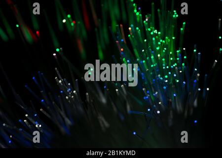 Connecting the dots fibre optical cables provide fast effective data transmission on networks for telecoms computing with laser light Stock Photo