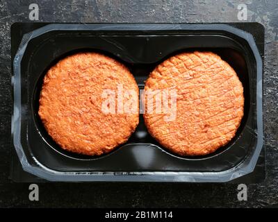 Two soy protein based vegan burgers. Stock Photo
