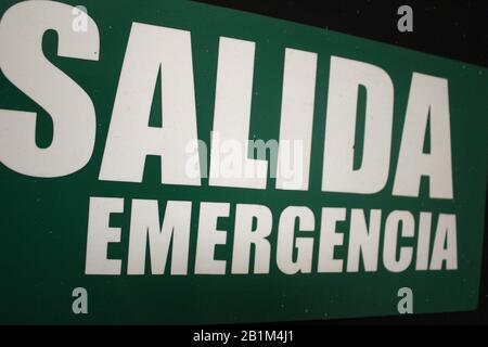 Green emergency exit sign Stock Photo