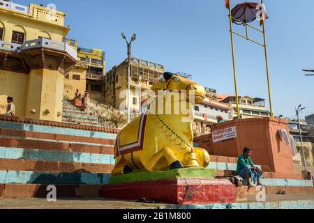 Sacred cow statue, iconic statue of Nandi at Gaay Ghat in Viranasi. India Stock Photo