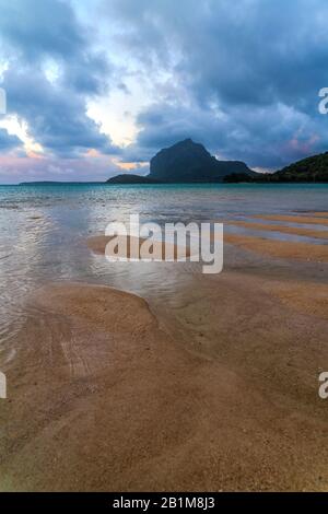 Dusk clouds on Le Morne mountain and tropical beach, Le Morne Brabant, Black River district, Indian Ocean, Mauritius Stock Photo