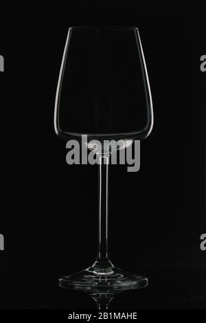 Empty wine glass on black background Stock Photo