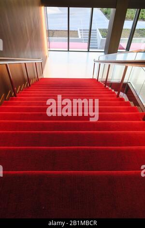 Red Carpeted Staircase Stock Photo