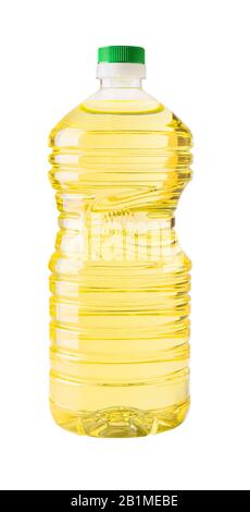 Cooking sunflower or vegetable oil in a 2l transparent bottle with green cap isolated on white background. Plastic container with recess for hands. Stock Photo