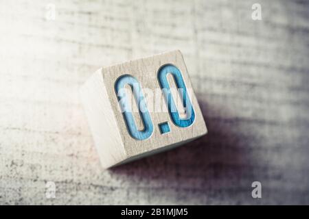 Number 0.0 On A Wooden Block On A Table Stock Photo