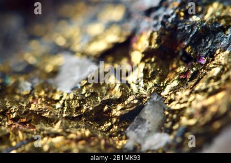 Golden background. Gold nugget. Backdrop for the project. Macro Stock Photo