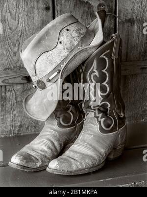BW02223-00...WYOMING - Hat and boots at the CM Ranch near Dubois. Ilford FP4+  4x5 Film. Stock Photo