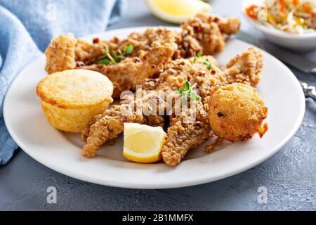 Southern fried fish with cornbread Stock Photo