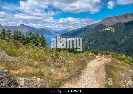 Famous Queenstown Hill Summit hiking trail with view over Lake Wakatipu, New Zealand. Royalty free stock photo. Stock Photo