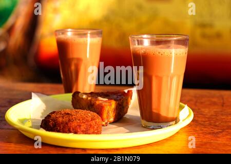 Indian style tea with evening snack in close up vibrant color Stock Photo