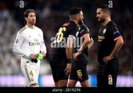 Real Madrid's Sergio Ramos leaves the pitch after being sent off for a professional foul during the UEFA Champions League round of 16 first leg match at the Santiago Bernabeu, Madrid. Stock Photo