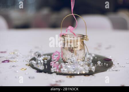 a decorative table centre peace on a table at a wedding reception or wedding breakfast Stock Photo