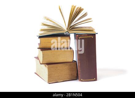 Old books with yellow pages isolated on white background Stock Photo