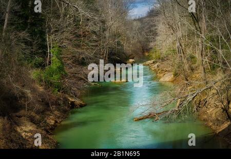 The Sipsey River and a tributary were flowing beautifully on an early spring afternoon. The Sipsey River flows through the Bankhead National Forest. Stock Photo