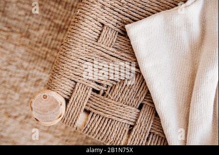 the texture of the different fabrics in beige and milky tones. Fabric twine next to cotton fabric Stock Photo