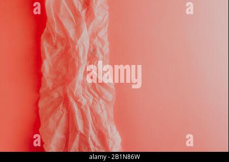 Peach pink background with different textures. Crumpled soft paper on a smooth clean paper background. Stock Photo