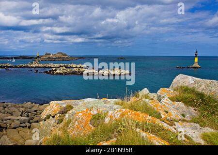 , rocky coast and beacons, France, Brittany, Finistere, Roscoff Stock Photo