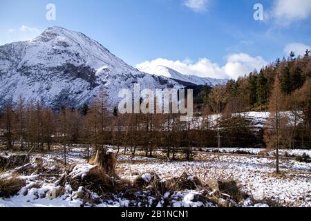 Snow covered Craig Mellon and Cairn Broadlands Munros situated at Glen Doll within the Cairngorms National Park in Scotland near Kirriemuir, UK Stock Photo