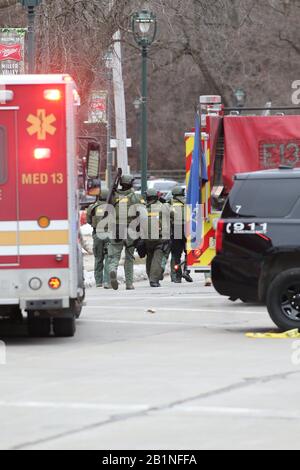 Milwaukee, Wisconsin, USA. 26th Feb, 2020. Tactical police officers arrive at the scene of the shooting. In one of the worst shootings in Wisconsin history, six people were killed during a shooting rampage on the Milwaukee campus of Molson Coors on Wednesday afternoon. Credit: Pat A. Robinson/ZUMA Wire/ZUMAPRESS.com/Alamy Live News