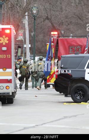 Milwaukee, Wisconsin, USA. 26th Feb, 2020. Tactical police officers arrive at the scene of the shooting. In one of the worst shootings in Wisconsin history, six people were killed during a shooting rampage on the Milwaukee campus of Molson Coors on Wednesday afternoon. Credit: Pat A. Robinson/ZUMA Wire/ZUMAPRESS.com/Alamy Live News