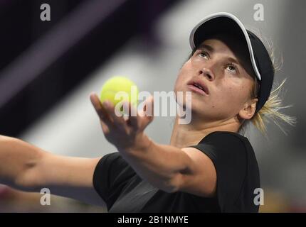 Doha, Qatar. 26th Feb, 2020. Yulia Putintseva of Kazakhstan serves during the women's singles third round match against Belinda Bencic of Switzerland at the 2020 WTA Qatar Open in Doha, Qatar, Feb. 26, 2020. Credit: Nikku/Xinhua/Alamy Live News Stock Photo