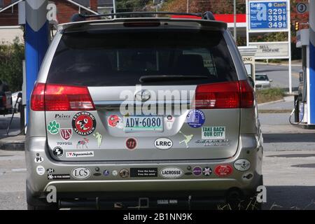 Van covered in bumper stickers Stock Photo