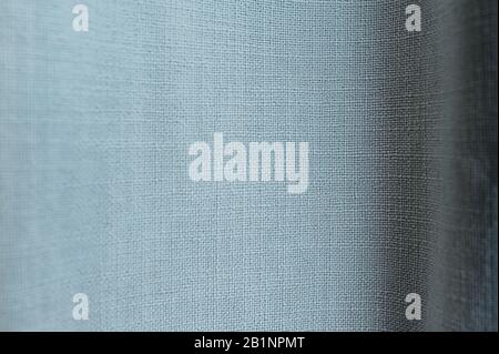 blue uniform texture of cotton fabric with large threads and knots Stock Photo
