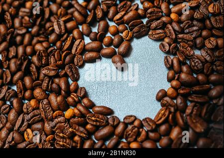 heart made from coffee beans for the whole frame, a beautiful postcard for a loved one, advertisement or coffee shop menu Stock Photo