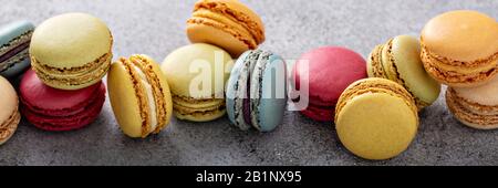 Variety of colorful macarons on the table Stock Photo