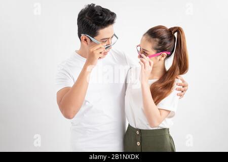 Cheerful happy family in glasses embracing and having vacation Stock Photo