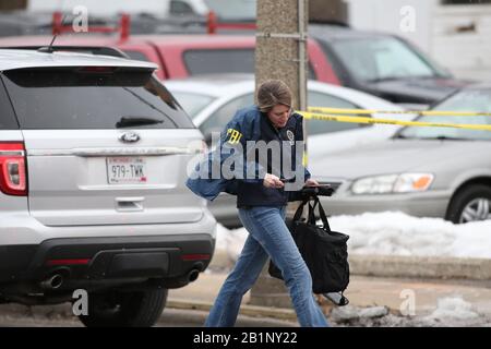 Milwaukee, Wisconsin, USA. 26th Feb, 2020. An FBI investigator arrives to the scene after an active shooter kills six and himself, at Miller Coors HQ in Milwaukee. In one of the worst shootings in Wisconsin history, six people were killed during a shooting rampage on the Milwaukee campus of Molson Coors. Credit: Pat A. Robinson/ZUMA Wire/Alamy Live News