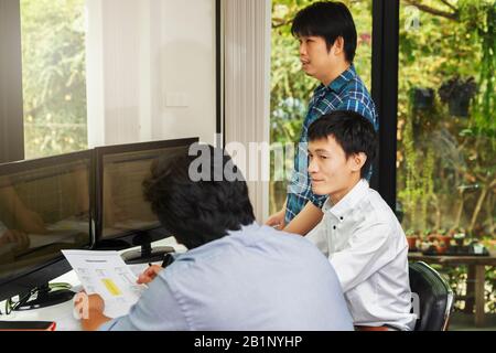 Programmers team working in a software developing. Developing programming and coding technologies. Website design. Cyber space concept. Stock Photo