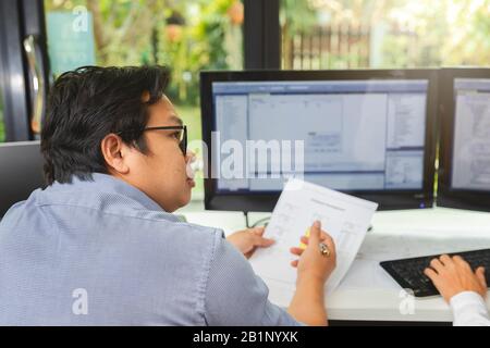 Programmer working in a software developing. Developing programming and coding technologies. Website design. Cyber space concept. Stock Photo