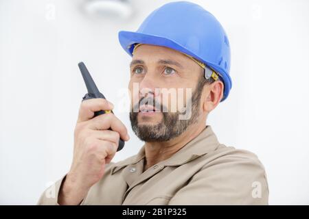 a man and security system operator Stock Photo