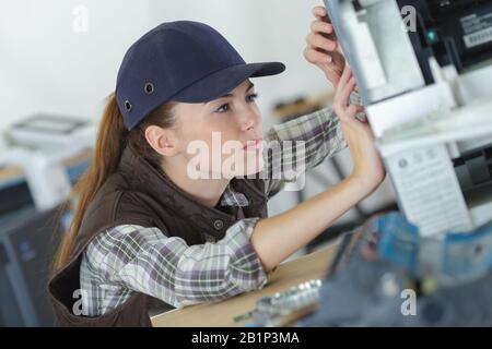 woman working with 3d printer Stock Photo