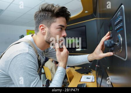 a security man is looking Stock Photo