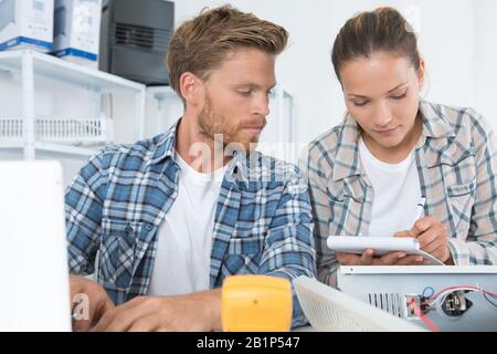 team of technicians working together Stock Photo