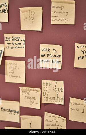 Wine Sticky Notes Wine-red wall with hanging yellow sticky notes Stock Photo - Alamy
