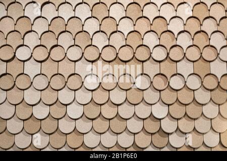 Wall with geometric pattern made from many parts Stock Photo