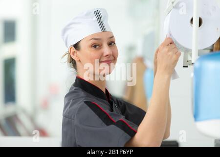 portrait of confident female worker in grocery store Stock Photo