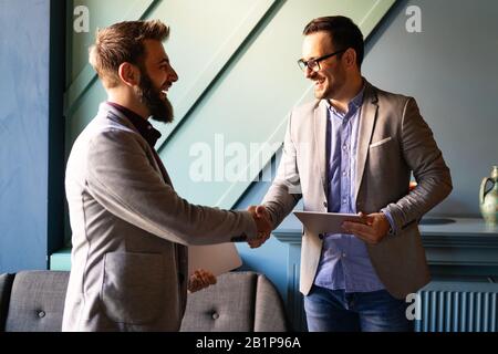 Business handshake and business people concept. Partnership, deal, agreement. Stock Photo
