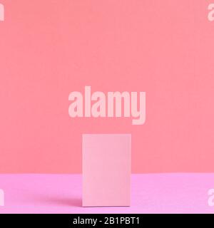 Pink memo paper, sticky notes on pink background Stock Photo